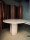 Round travertine dining table